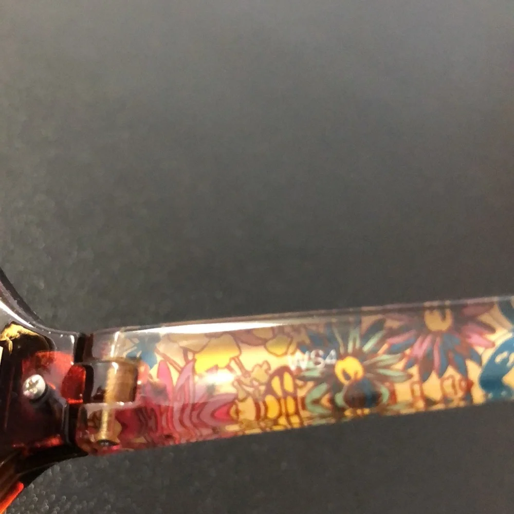 RELIC Sunglasses Brown Frames, Floral Temples, Cutout Lenses, Gold Detail - Picture 8 of 13